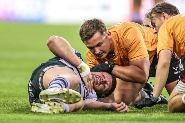 Physio treat Olly Russell of Huddersfield Giants as he is injured during the Betfred Super League round 18 match Huddersfield Giants vs Bradford Bulls at Accu Stadium, Huddersfield, United Kingdom on 10 July 2026

(Photo by Alfie Cosgrove/News Images)