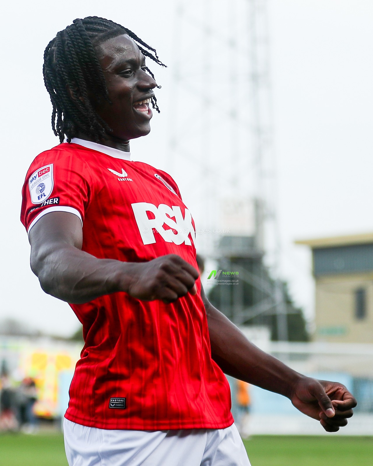 Micah Mbick of Charlton Athletic celebrates with the fans after the teams victory following the Sky Bet League 1 match Cambridge United vs Charlton Athletic at Cledara Abbey Stadium, Cambridge, United Kingdom, 12th April 2025

(Photo by Izzy Poles/News Images)