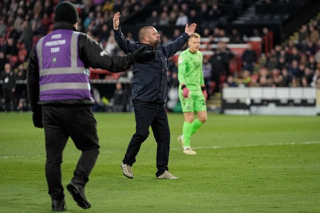 A pitch invader celebrates Yuki Ohashi of Blackburn Rovers scoring to make it 0-2 during the Sky Bet Championship match Sheffield United vs Blackburn Rovers at Bramall Lane, Sheffield, United Kingdom on 22 April 2026

(Photo by Maynard Manyowa/News Images)
