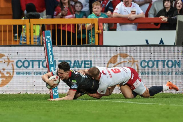 Nathan Lowe of Wigan Warriors goes over for a try during the Betfred Super League round 12 match Hull KR vs Wigan Warriors at Sewell Group Craven Park, Hull, United Kingdom on 21 May 2026

(Photo by Mark Cosgrove/News Images)