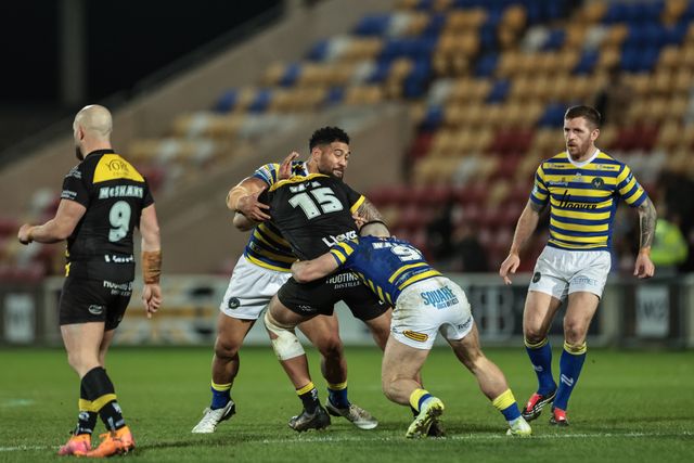 Xavier Va’a of York Knights is tackled by Toafofoa Sipley of Warrington Wolves and Danny Walker of Warrington Wolves  during the Betfred Super League Round 4 match York Knights vs Warrington Wolves at LNER Community Stadium, York, United Kingdom on 06 March 2026

(Photo by Mark Cosgrove/News Images)
