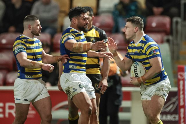 George Williams of Warrington Wolves celebrates his try with team mates during the Betfred Super League Round 4 match York Knights vs Warrington Wolves at LNER Community Stadium, York, United Kingdom on 06 March 2026

(Photo by Mark Cosgrove/News Images)