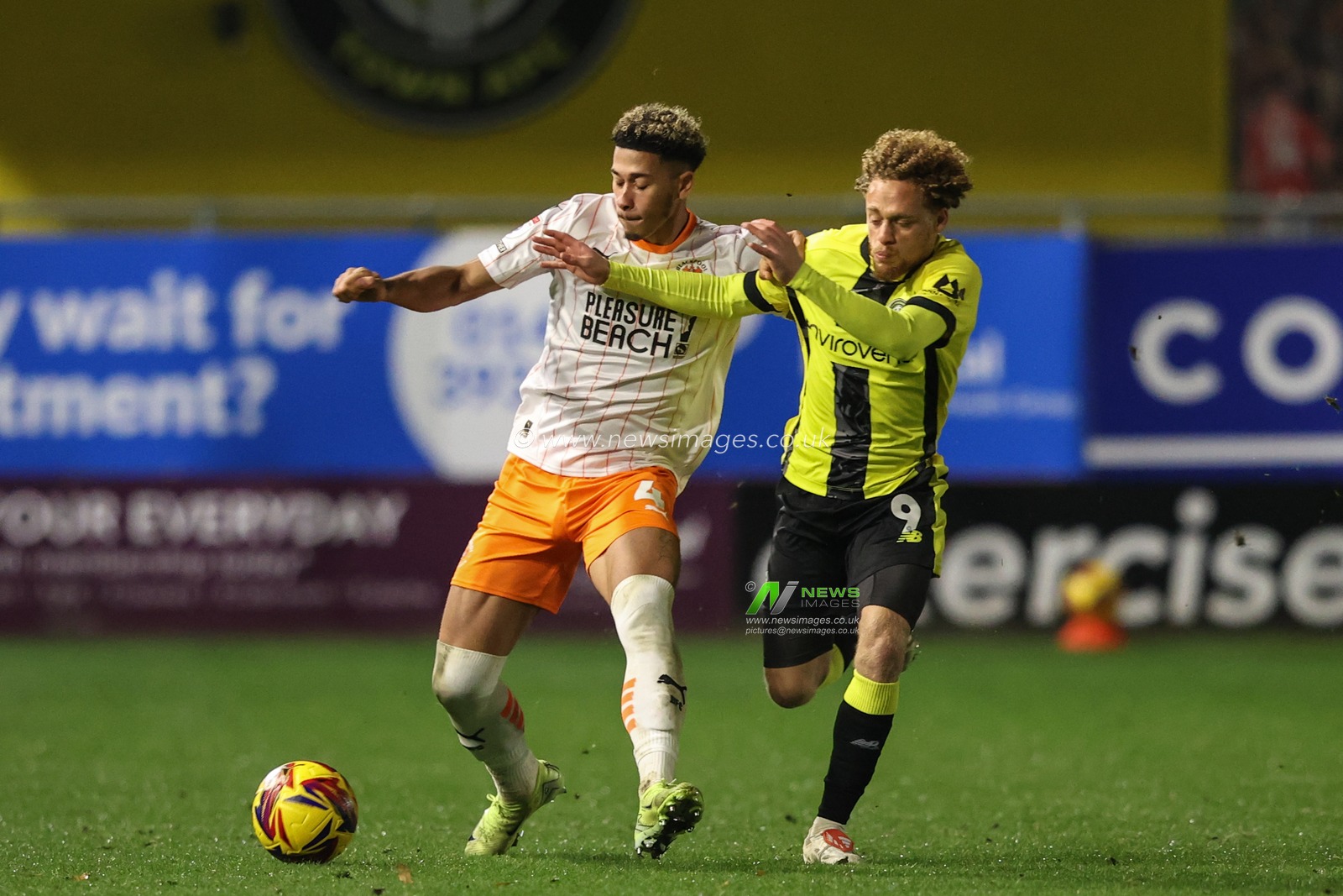 Jordan Lawrence-Gabriel of Blackpool and Stephen Duke-McKenna of Harrogate Town battle for the ball during the Bristol Street Motors Trophy match Harrogate Town vs Blackpool at Wetherby Road, Harrogate, United Kingdom, 12th November 2024

(Photo by Alfie Cosgrove/News Images)