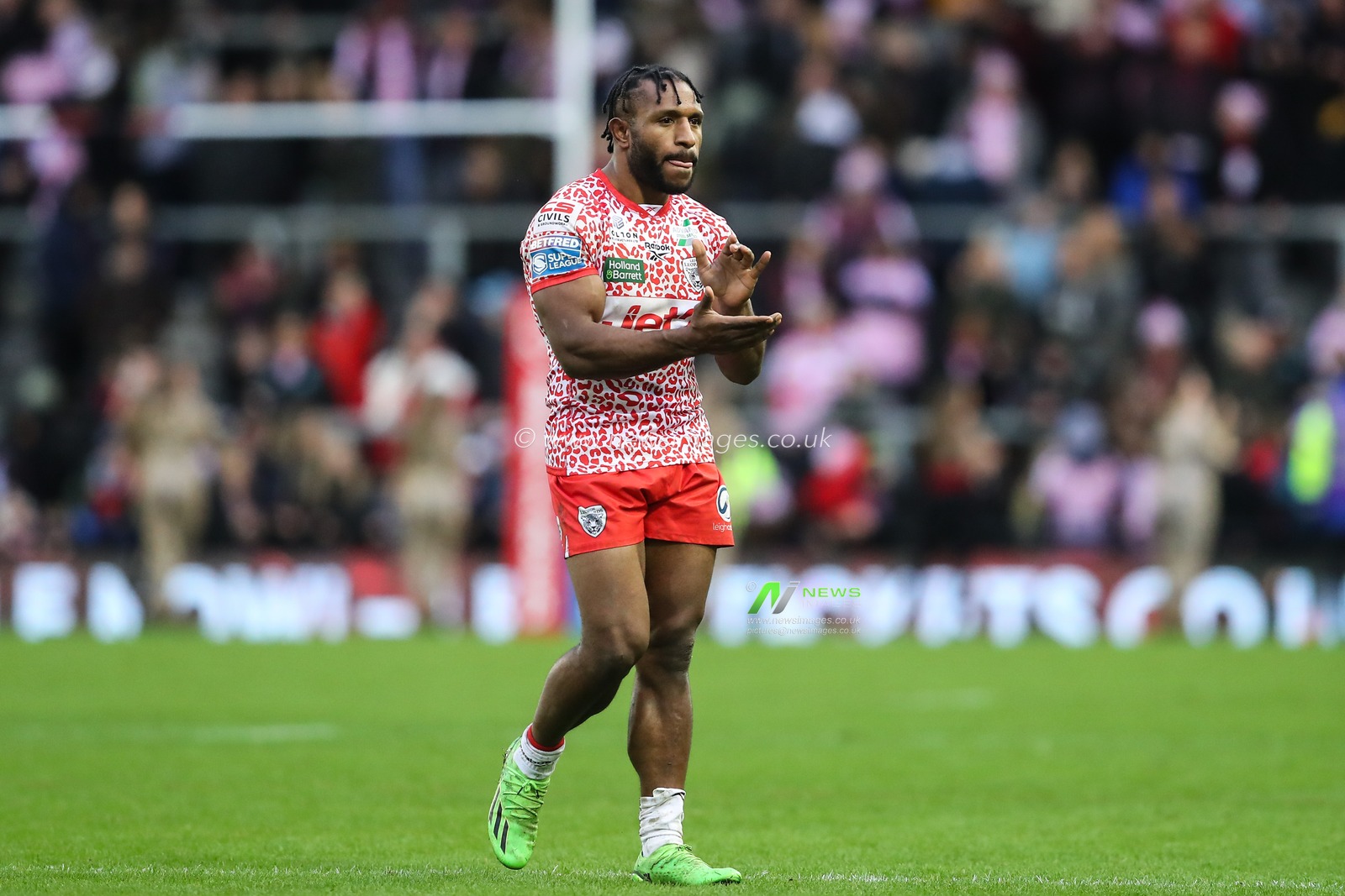 Edwin Ipape of Leigh Leopards applauds the home fans after the Betfred Super League Round 2 match Leigh Leopards vs Huddersfield Giants at Leigh Sports Village, Leigh, United Kingdom, 23rd February 2025

(Photo by Gareth Evans/News Images)