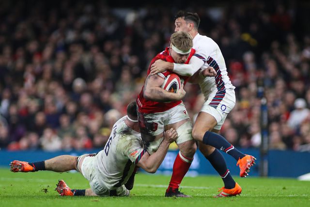 Aaron Wainwright of Wales is tackled by Tom Curry and Alex Mitchell of England during the 2025 Guinness 6 Nations match Wales vs England at Principality Stadium, Cardiff, United Kingdom, 15th March 2025

(Photo by Andrew Lewis/News Images)