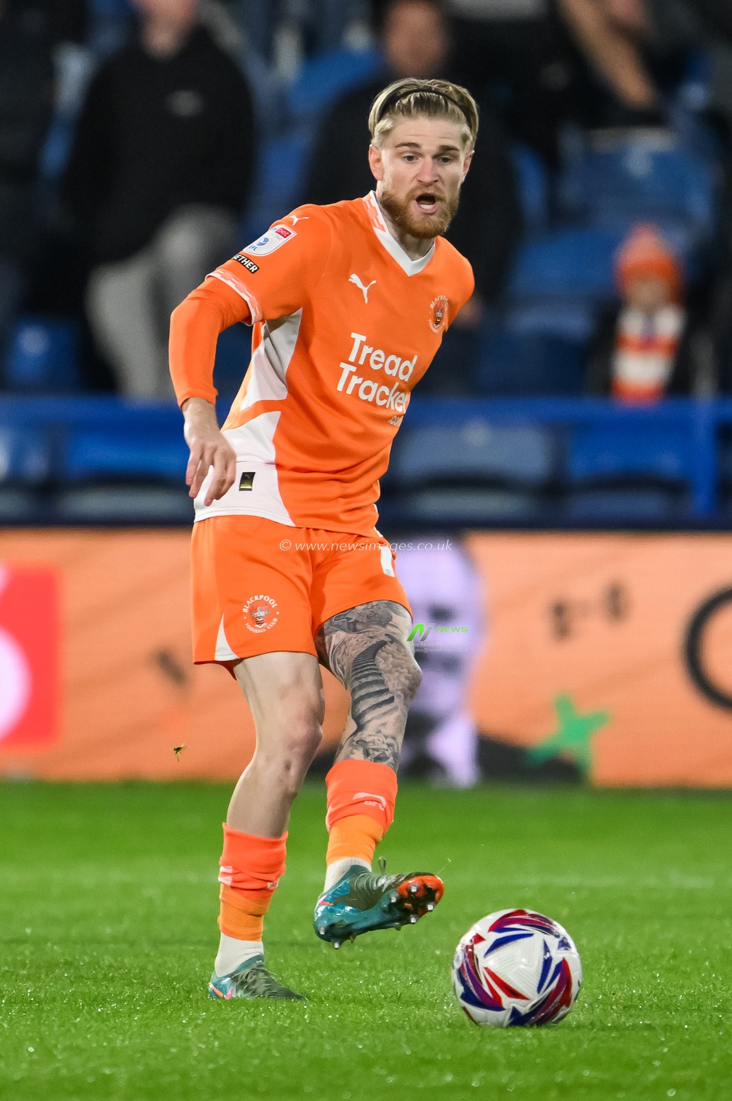 Hayden Coulson of Blackpool passes the ball during the Sky Bet League 1 match Huddersfield Town vs Blackpool at John Smith's Stadium, Huddersfield, United Kingdom, 24th September 2024

(Photo by Craig Thomas/News Images)
