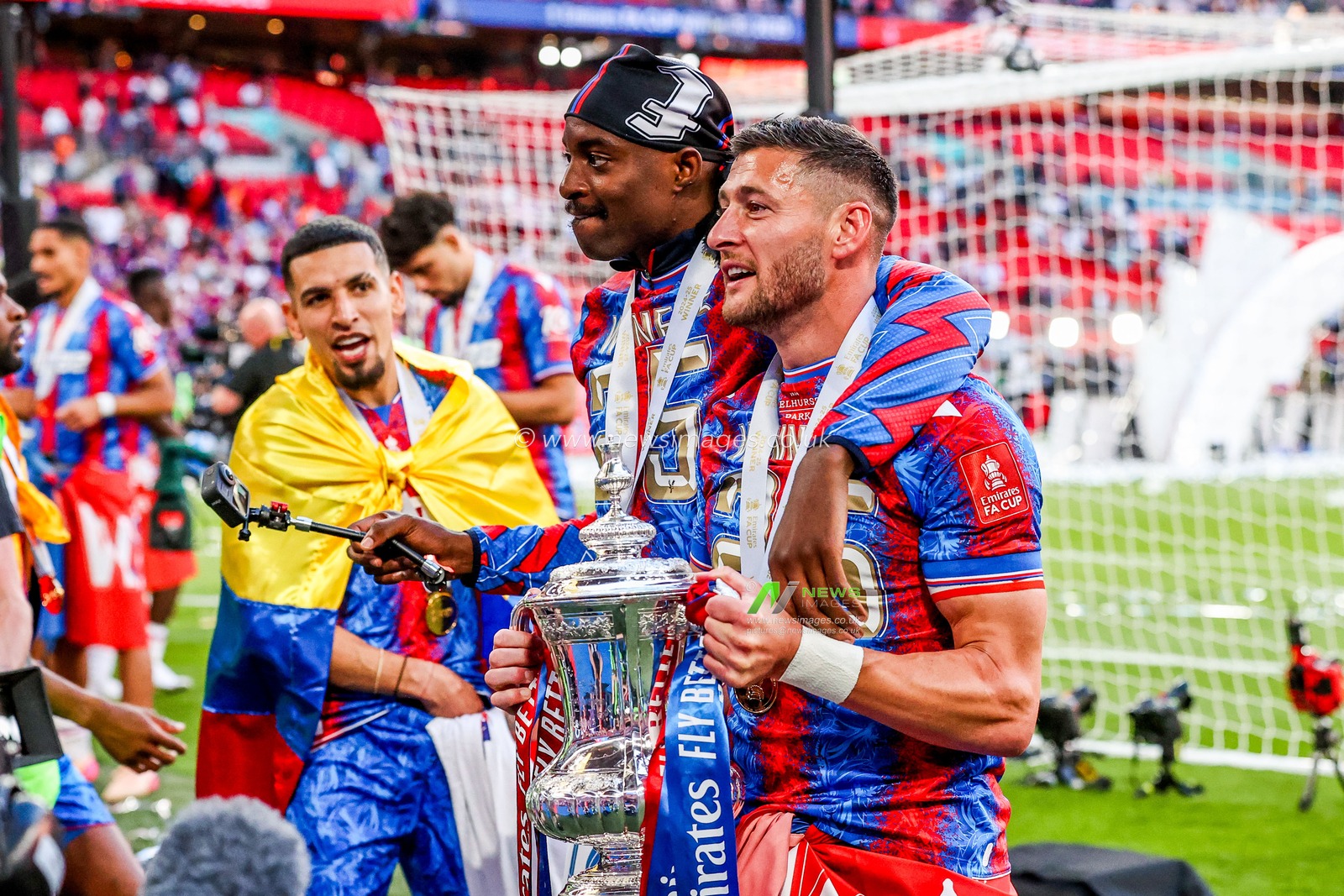 Jean-Philippe Mateta and Joel Ward of Crystal Palace celebrate with the FA Cup after the teams victory following the Emirates FA Cup Final match Crystal Palace vs Manchester City at Wembley Stadium, London, United Kingdom, 17th May 2025

(Photo by Alfie Cosgrove/News Images)