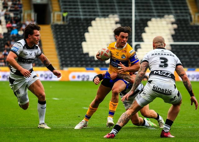 Brodie Croft of Leeds Rhinos is tackled by Jordan Lane of Hull FC during the Betfred Super League Round 24 match Hull FC vs Leeds Rhinos at MKM Stadium, Hull, United Kingdom, 30th August 2025

(Photo by Richard Bierton/News Images)