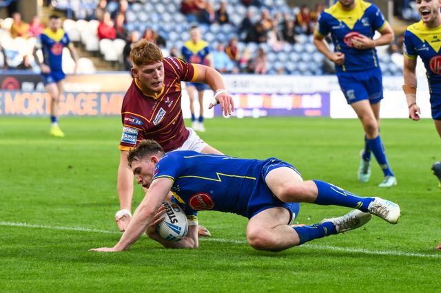 Matty Nicholson of Warrington Wolves goes over for a try during the Betfred Super League Round 26 match Huddersfield Giants vs Warrington Wolves at John Smith's Stadium, Huddersfield, United Kingdom, 14th September 2024

(Photo by Craig Thomas/News Images)