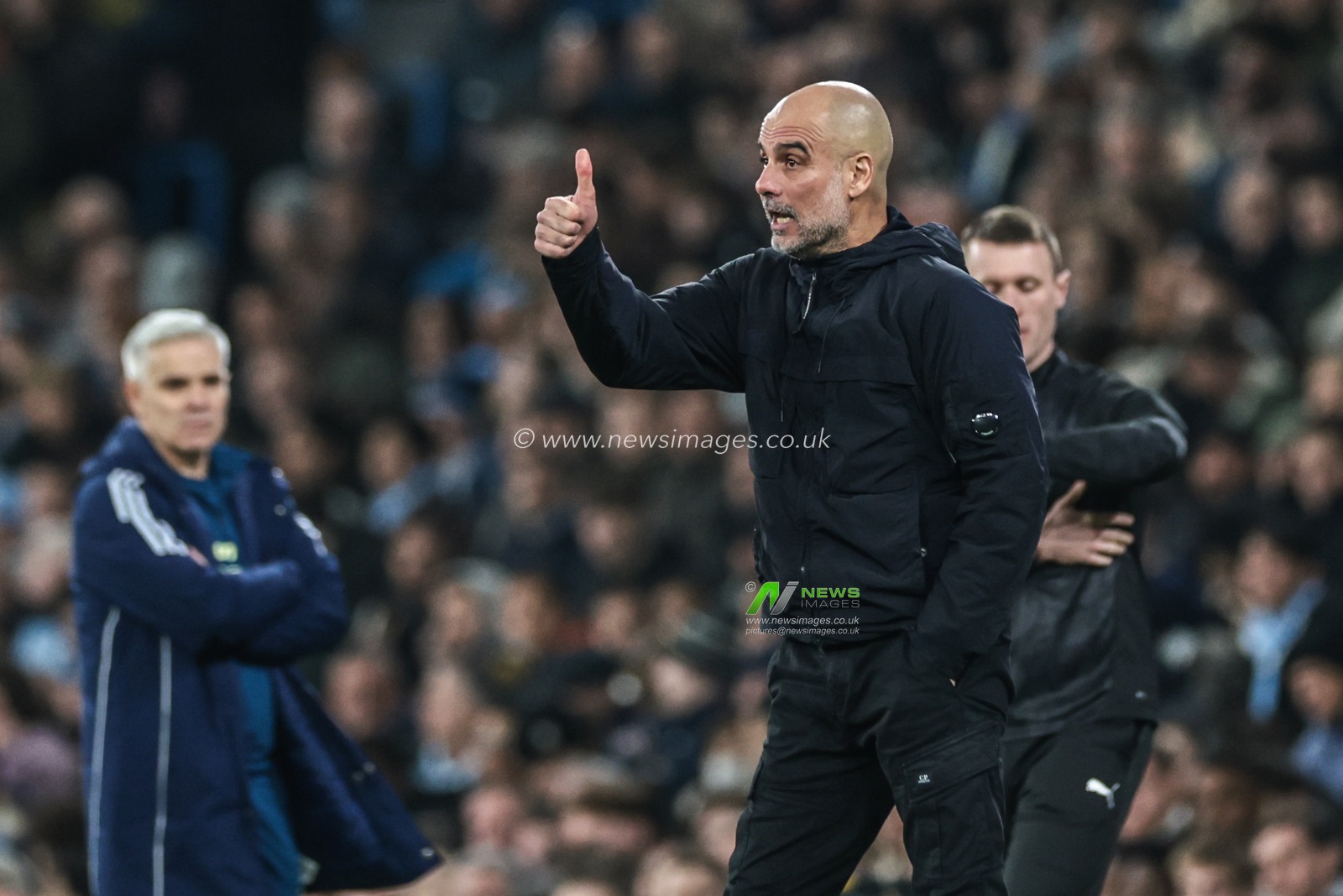 Pep Guardiola manager of Manchester City gives his team a thumbs up during the Premier League match Manchester City vs Nottingham Forest at Etihad Stadium, Manchester, United Kingdom on 04 March 2026

(Photo by Mark Cosgrove/News Images)