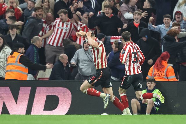 Daniel Ballard of Sunderland celebrates his goal to make it 1-1 during the Sky Bet Championship Playoff Semi-final match Sunderland vs Coventry City at Stadium Of Light, Sunderland, United Kingdom, 13th May 2025

(Photo by Alfie Cosgrove/News Images)