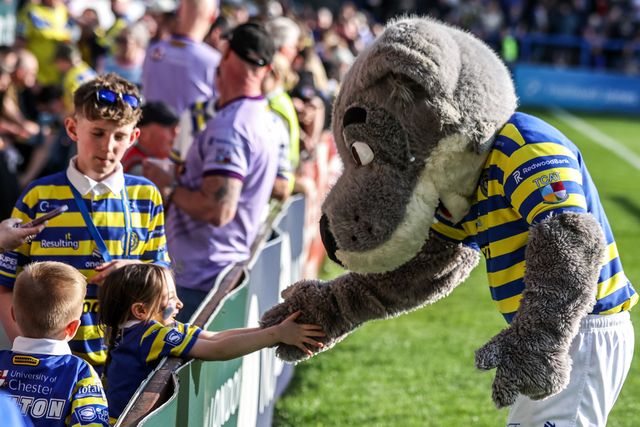 Warrington Wolves mascot ‘Wolfie’ meets the fans during the Betfred Super League round 5 match Warrington Wolves vs Castleford Tigers at The Halliwell Jones Stadium, Warrington, United Kingdom on 21 March 2026

(Photo by Alfie Cosgrove/News Images)
