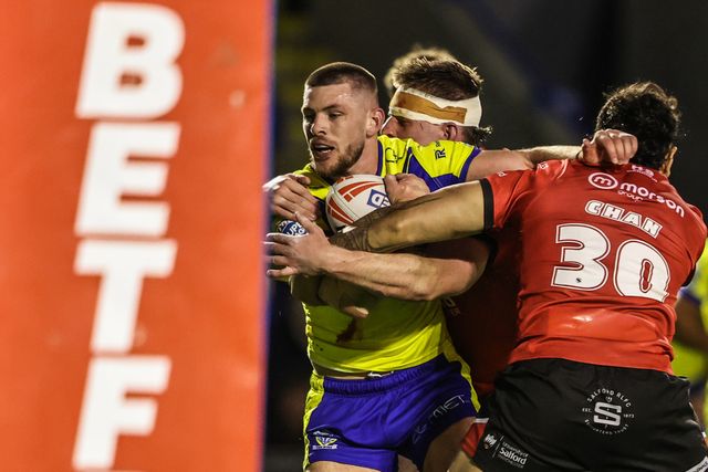 Danny Walker of Warrington Wolves is tackled during the Betfred Super League Round 24 match Warrington Wolves vs Salford Red Devils at Halliwell Jones Stadium, Warrington, United Kingdom, 29th August 2025

(Photo by Alfie Cosgrove/News Images)