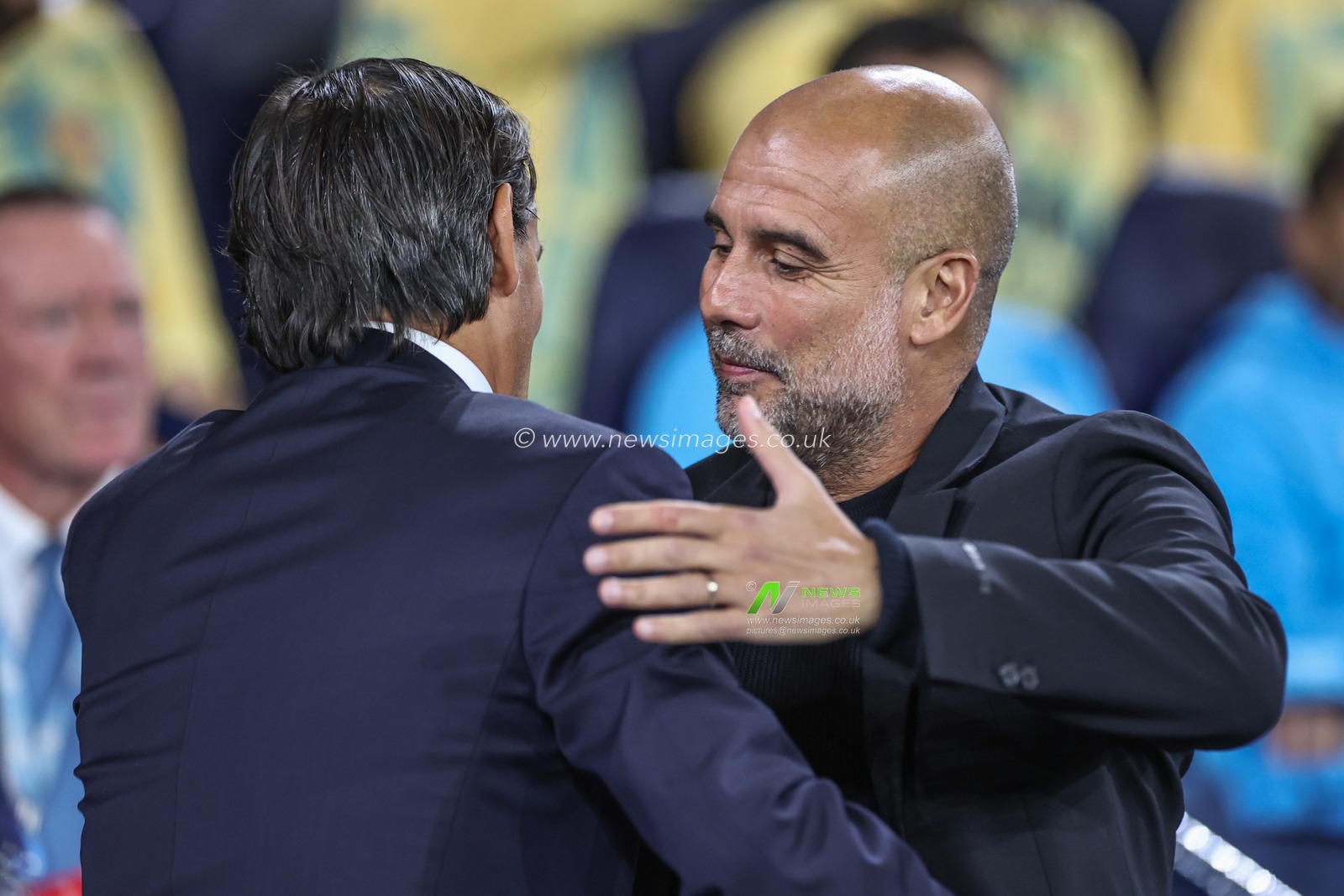Simone Inzaghi manager of Inter Milan embraces Pep Guardiola manager of Manchester City before the game during the UEFA Champions League league stage match Manchester City vs Inter Milan at Etihad Stadium, Manchester, United Kingdom, 18th September 2024

(Photo by Mark Cosgrove/News Images)