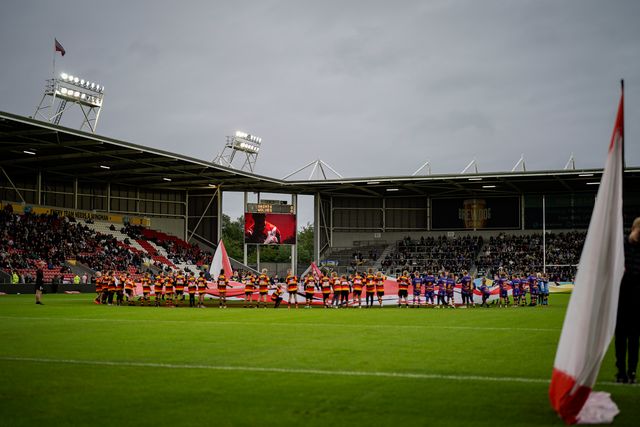 Fans and mascots prior to kick off during the Betfred Super League round 14 match St Helens vs Warrington Wolves at The BrewDog Stadium, St Helens, United Kingdom on 11 June 2026

(Photo by Maynard Manyowa/News Images)