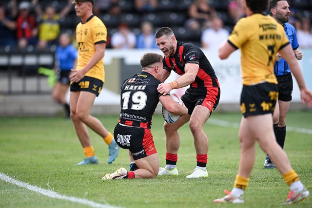Leon Hayes and Danny Walker of Warrington Wolves celebrate following making a try during the Betfred Super League round 21 match Castleford Tigers vs Warrington Wolves at OneBore Stadium, Castleford, Untied Kingdom on 01 August 2026

(Photo by Ben Roberts/News Images)
