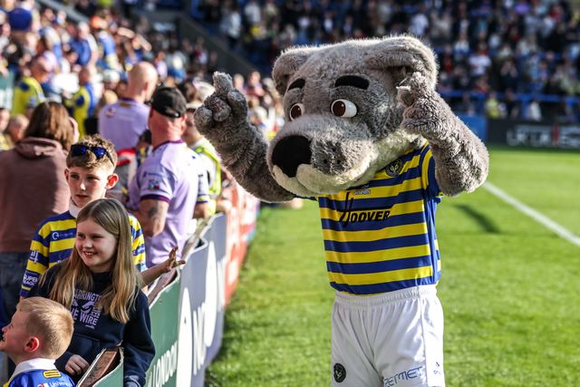 Warrington Wolves mascot ‘Wolfie’ meets the fans during the Betfred Super League round 5 match Warrington Wolves vs Castleford Tigers at The Halliwell Jones Stadium, Warrington, United Kingdom on 21 March 2026

(Photo by Alfie Cosgrove/News Images)