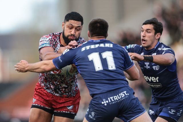 Isaac Liu of Leigh Leopards is tackled by Maxime Stefani of Toulouse Olympique during the Betfred Super League round 6 match Leigh Leopards vs Toulouse at Leigh Sports Village, Leigh, United Kingdom on 28 March 2026

(Photo by Mark Cosgrove/News Images)