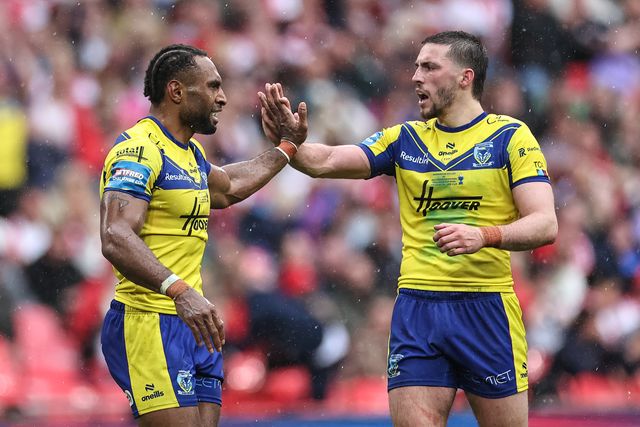 Rodrick Tai of Warrington Wolves high-fives Adam Holroyd of Warrington Wolves during the Betfred Challenge Cup Final Warrington Wolves vs Hull KR at Wembley Stadium, London, United Kingdom, 7th June 2025

(Photo by Mark Cosgrove/News Images)