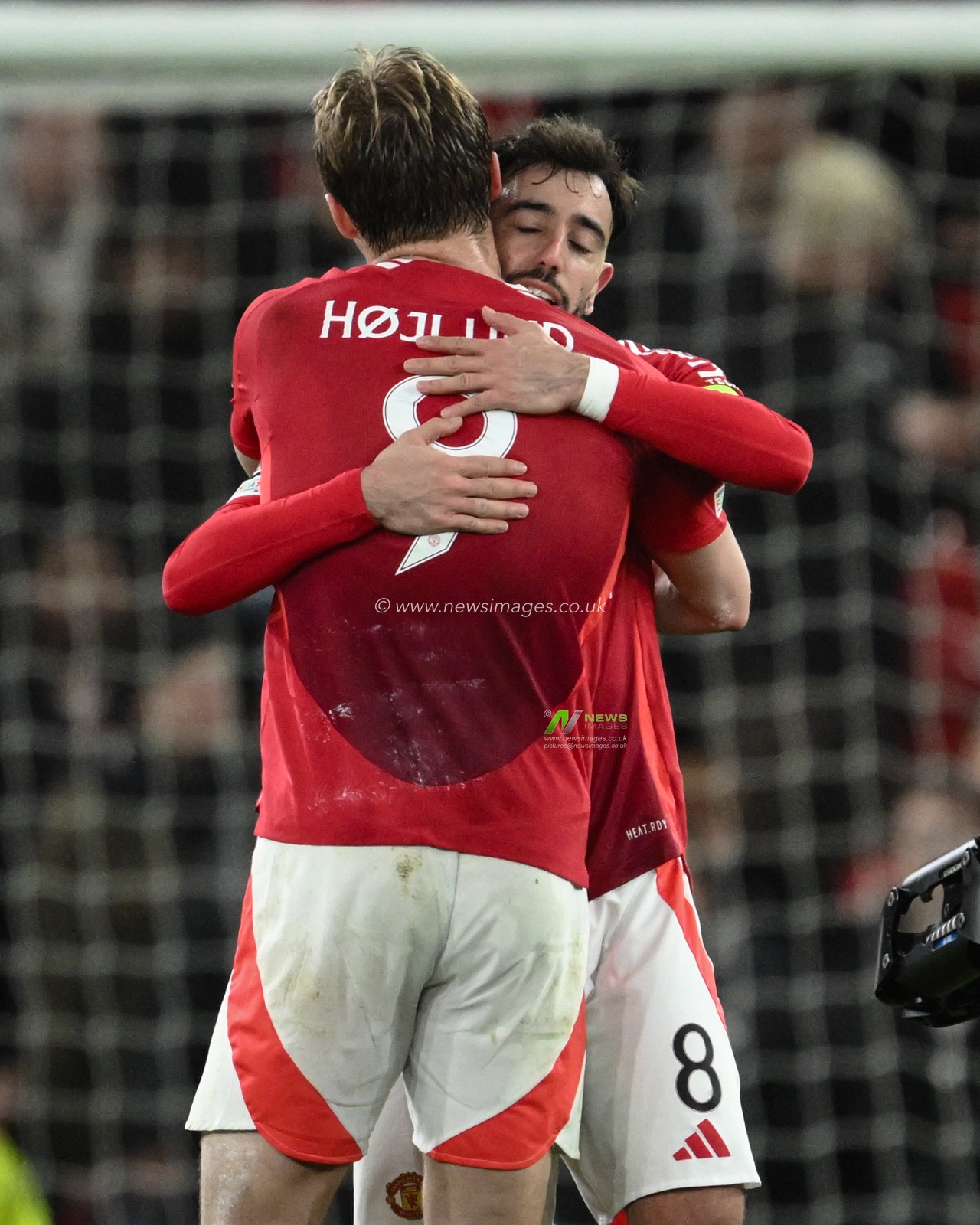 Rasmus HÃ¸jlund of Manchester United embraces hat-trick goal hero Bruno Fernandes of Manchester United during the UEFA Europa League Last 16 match Manchester United vs Real Sociedad at Old Trafford, Manchester, United Kingdom, 13th March 2025

(Photo by Craig Thomas/News Images)