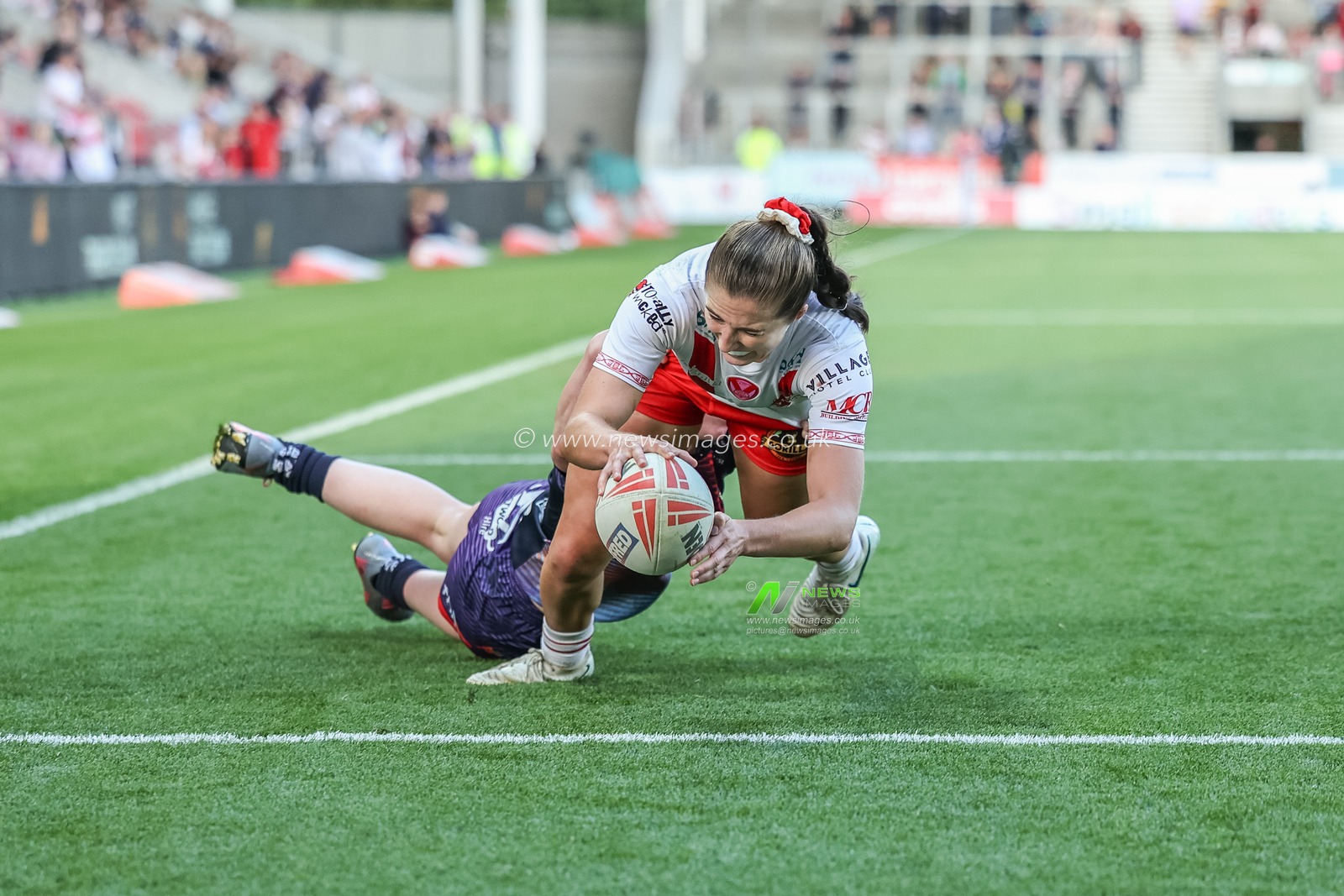 Phoebe Hook of St Helens goes over for a try to make it 20-20 during the Betfred Women's Super League Round 13 match St Helens Women vs Wigan Warriors Women at Totally Wicked Stadium, St Helens, United Kingdom, 5th September 2025

(Photo by Mark Cosgrove/News Images)