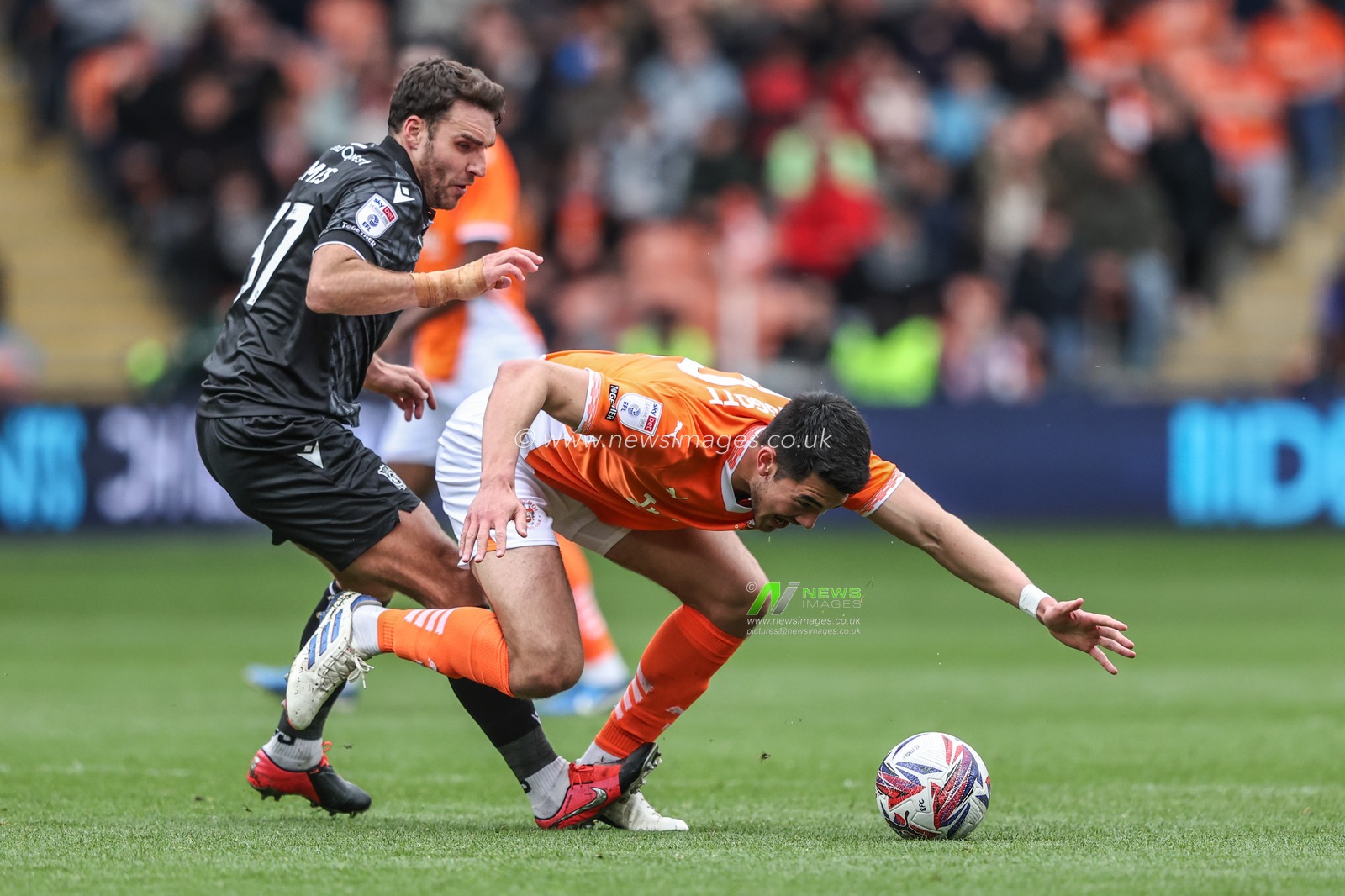 Elkan Baggott of Blackpool is fouled by Matthew James of Wrexham during the Sky Bet League 1 match Blackpool vs Wrexham at Bloomfield Road, Blackpool, United Kingdom, 21st April 2025

(Photo by Alfie Cosgrove/News Images)
