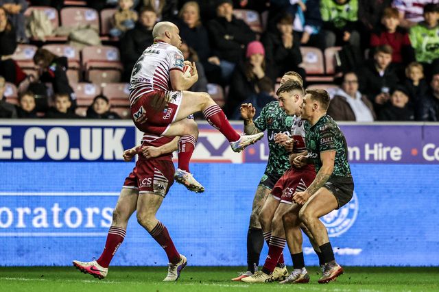 Liam Marshall of Wigan Warriors jumps up to win the high ball during the Betfred Super League match Wigan Warriors vs Leigh Leopards at The Brick Community Stadium, Wigan, United Kingdom on 26 February 2026

(Photo by Alfie Cosgrove/News Images)