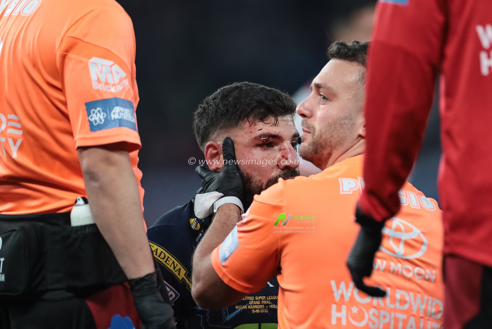 Abbas Miski of Wigan Warriors receives treatment during the 2025 Betfred Super League Grand Final Hull KR v Wigan Warriors at Old Trafford, Manchester, United Kingdom, 11th October 2025

(Photo by Mark Cosgrove/News Images)