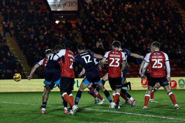 Oliver Casey of Blackpool scores to make it 0-2 during the Sky Bet League 1 match Lincoln City vs Blackpool at Gelder Group Sincil Bank Stadium, Lincoln, United Kingdom, 28th January 2025

(Photo by Mark Cosgrove/News Images)