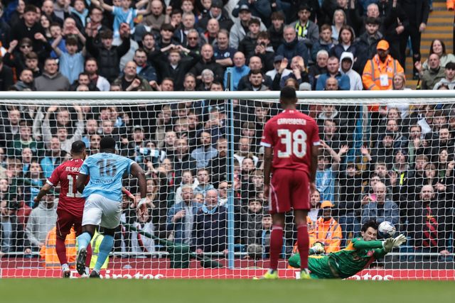 Manchester City goalkeeper James Trafford saves a penalty from Mohamed Salah of Liverpool during the Emirates FA Cup Quarter-Final match Manchester City vs Liverpool at Etihad Stadium, Manchester, United Kingdom on 04 April 2026

(Photo by Mark Cosgrove/News Images)