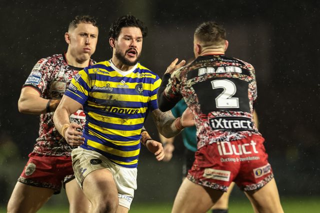 Keanan Brand of Leigh Leopards is tackled by James Bentley of Warrington Wolves during the Pre Season match Warrington Wolves vs Leigh Leopards at Halliwell Jones Stadium, Warrington, United Kingdom, 30th January 2026

(Photo by Mark Cosgrove/News Images)