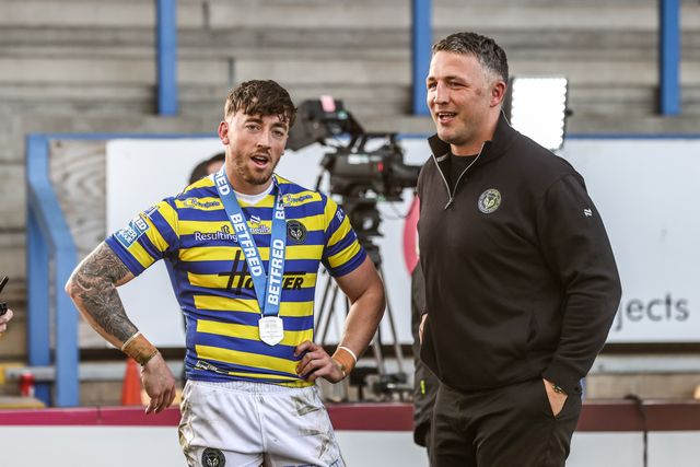 Player of the match Matty Ashton of Warrington Wolves and head coach Sam Burgess during the Betfred Super League round 5 match Warrington Wolves vs Castleford Tigers at The Halliwell Jones Stadium, Warrington, United Kingdom on 21 March 2026

(Photo by Alfie Cosgrove/News Images)