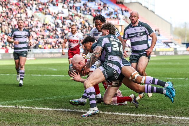 Liam Farrell of Wigan Warriors goes over however video review says no try during the Betfred Super League round 6 match Wigan Warriors vs Huddersfield Giants at The Brick Community Stadium, Wigan, United Kingdom on 28 March 2026

(Photo by Alfie Cosgrove/News Images)