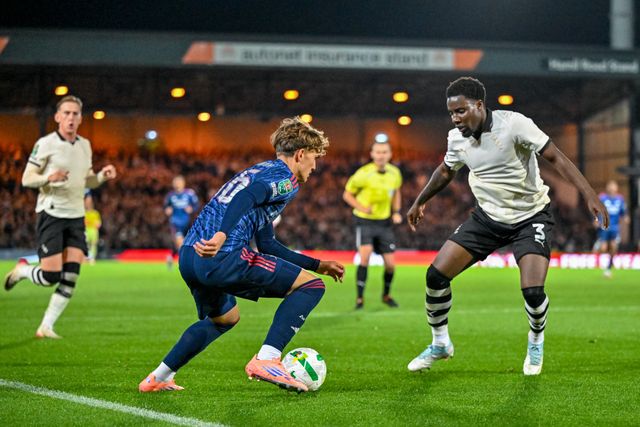 Max Dowman of Arsenal  takes the ball into the Port Vale area, shadowed by Jaheim Headley of Port Vale during the Carabao Cup Round 3 match Port Vale vs Arsenal at Vale Park, Burslem, United Kingdom, 24th September 2025

(Photo by Adam Gee/News Images)