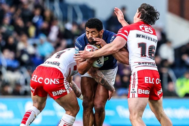 Kallum Watkins of Leeds Rhinos is tackled by Curtis Sironen of St Helens and Matt Whitley of St Helens during the Betfred Super League round 13 match Leeds Rhinos vs St Helens at AMT Headingley Stadium, Leeds, United Kingdom on 04 June 2026

(Photo by Alfie Cosgrove/News Images)