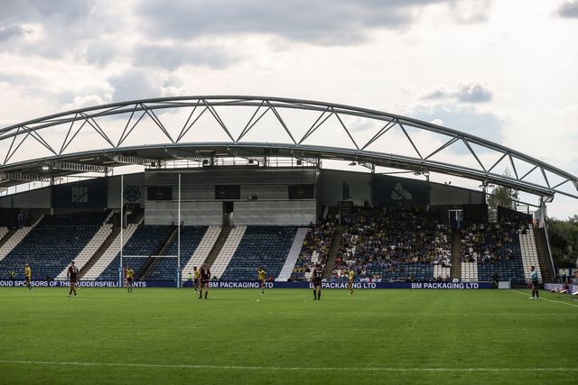 Warrington fans in the away end at Accu Stadium during the Betfred Super League Round 23 match Huddersfield Giants vs Warrington Wolves at Accu Stadium, Huddersfield, United Kingdom, 24th August 2025

(Photo by Alfie Cosgrove/News Images)