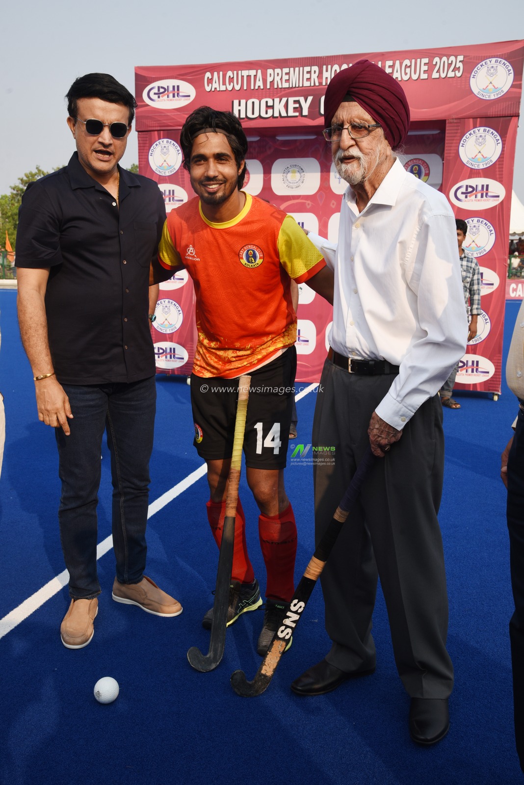 Veteran Indian Cricketer Sourav Ganguly with  Veteran Olympian Gurbax Singh,right and East Bengal hockey player Sunil at the Final Day Calcutta Premier Hockey League 2025 final  match between Mohan Bagan AC and East Bengal Club at Dumurjala Sports Complex in Howrah,West Bengal,India on March 23,2025,Pictures by Debajyoti Chakraborty.(Photo: Debajyoti Chakraborty/News Images)