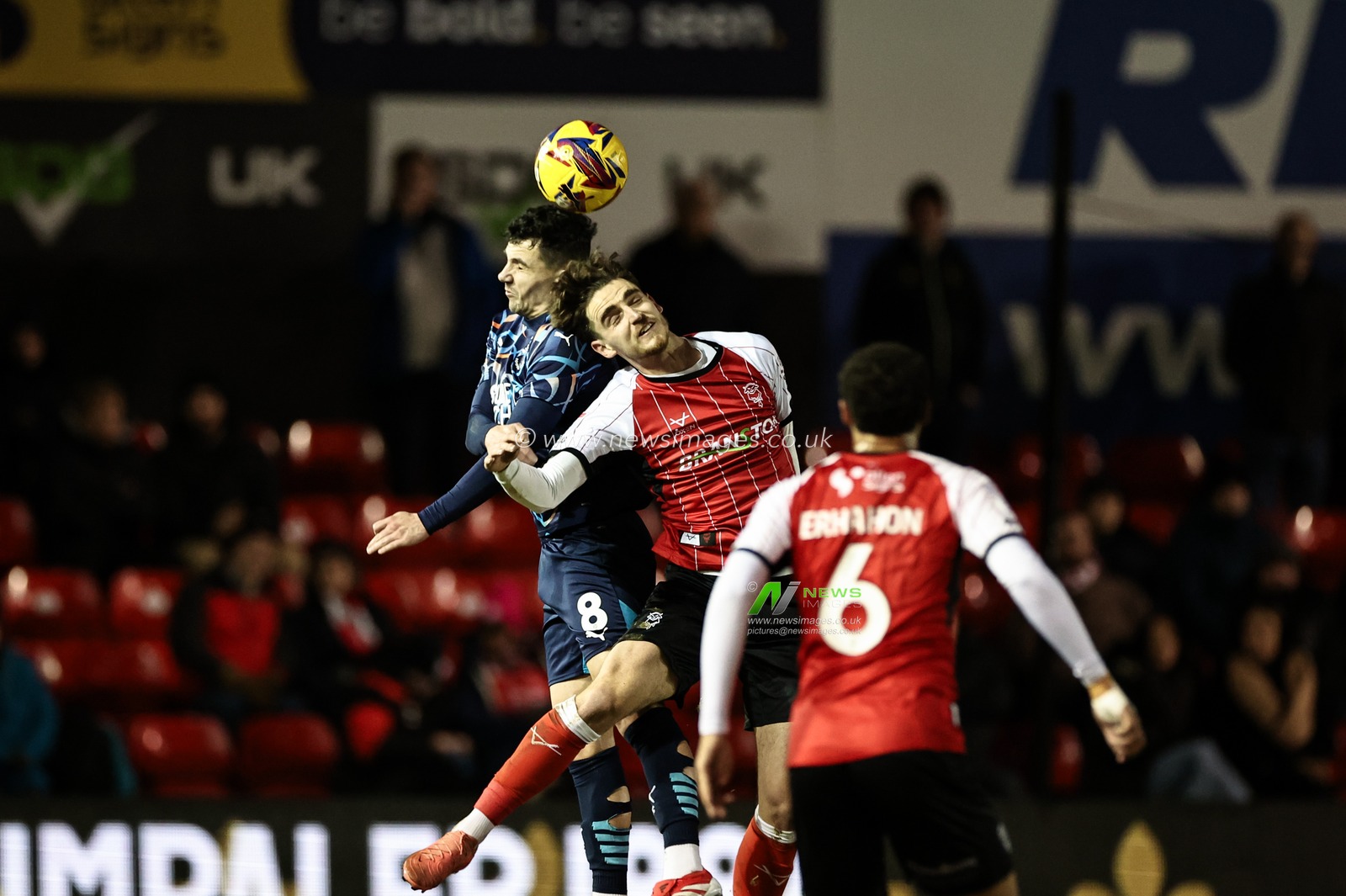 Albie Morgan of Blackpool jumps up to win the high ball during the Sky Bet League 1 match Lincoln City vs Blackpool at Gelder Group Sincil Bank Stadium, Lincoln, United Kingdom, 28th January 2025

(Photo by Mark Cosgrove/News Images)
