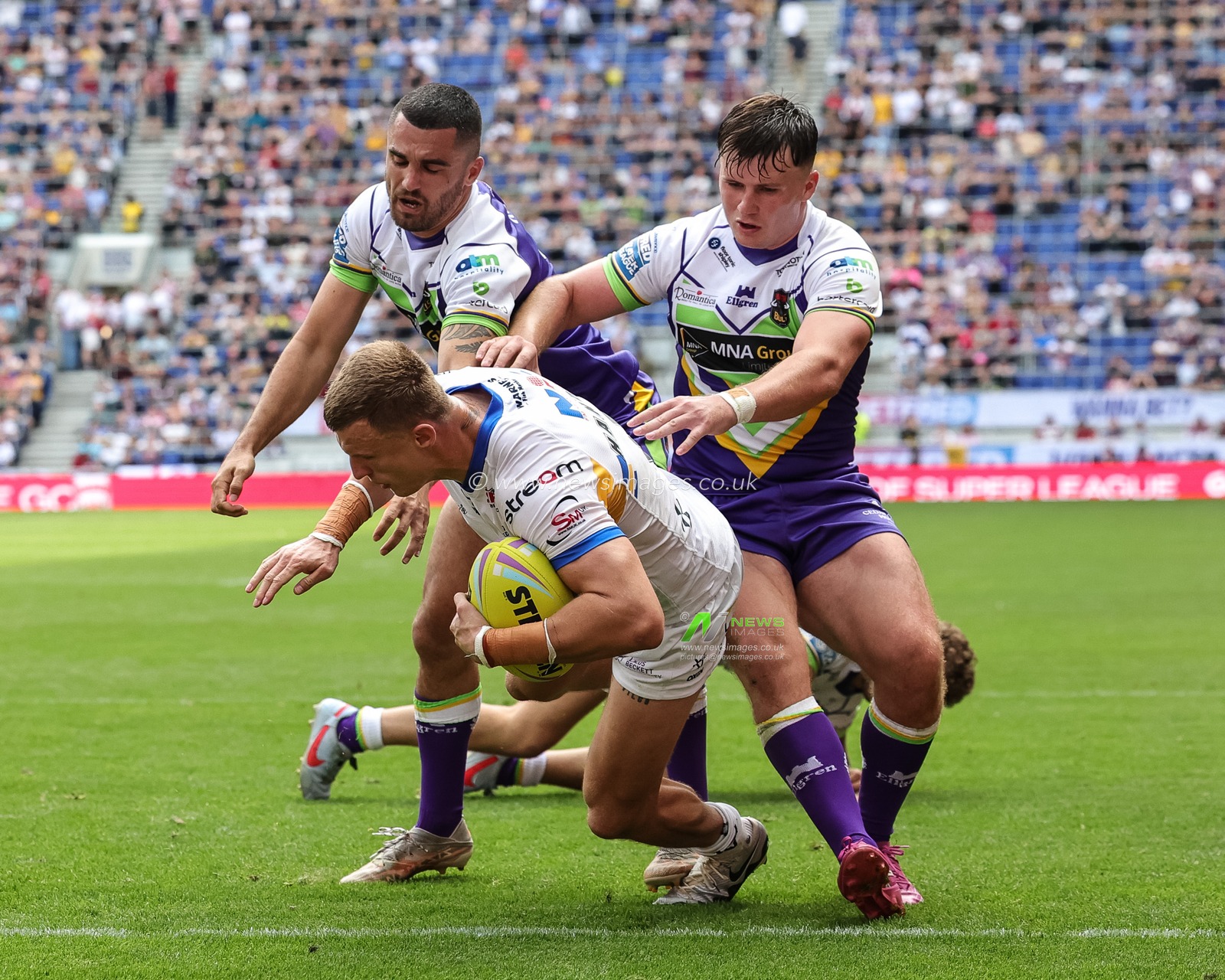 Ash Handley of Leeds Rhinos goes over for a try during the Betfred Super League Magic Weekend match Leeds Rhinos vs Bradford Bulls at Hill Dickinson Stadium, Liverpool, United Kingdom on 05 July 2026

(Photo by Mark Cosgrove/News Images)