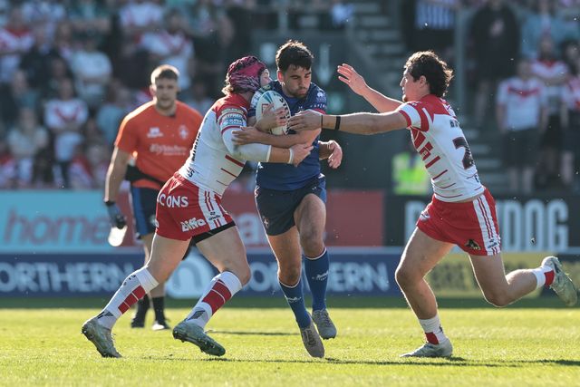Jack Sinfield of Wakefield Trinity is tackled by Jackson Hastings of St Helens R.F.C. during the Betfred Super League round 9 match St Helens vs Wakefield Trinity at The BrewDog Stadium, St Helens, United Kingdom on 25 April 2026

(Photo by Mark Cosgrove/News Images)
