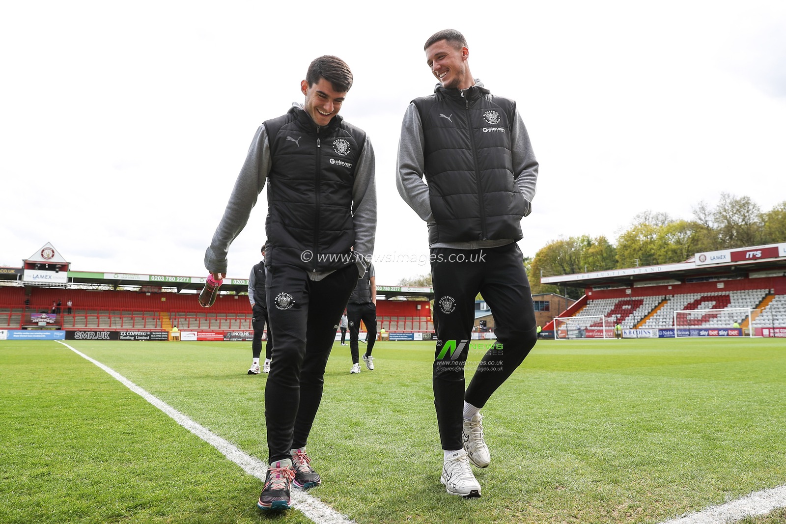 Rob Apter of Blackpool and Oliver Casey of Blackpool arrive ahead of the Sky Bet League 1 match Stevenage vs Blackpool at Lamex Stadium, Stevenage, United Kingdom, 18th April 2025

(Photo by Gareth Evans/News Images)