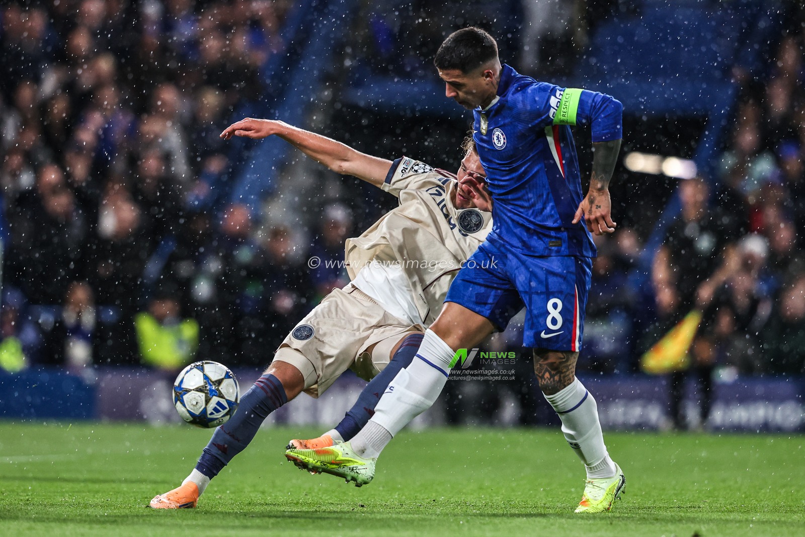 Mika Godts of Ajax and Enzo Fernández of Chelsea battle for the ball during the UEFA Champions League Matchday 3 of 8 Chelsea vs Ajax at Stamford Bridge, London, United Kingdom, 22nd October 2025

(Photo by Alfie Cosgrove/News Images)