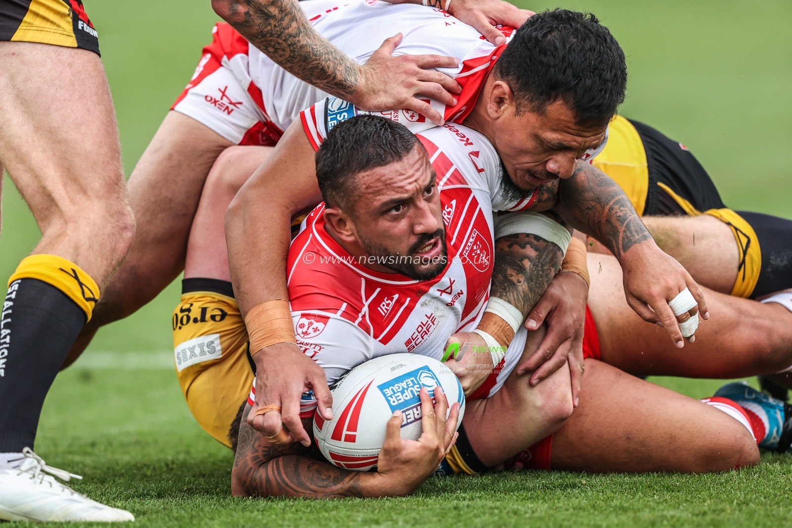 Elliot Minchella of Hull KR is tackled during the Betfred Super League round 21 match Hull KR vs Castleford Tigers at Sewell Group Craven Park, Kingston upon Hull, United Kingdom, 9th August 2025

(Photo by Alfie Cosgrove/News Images)
