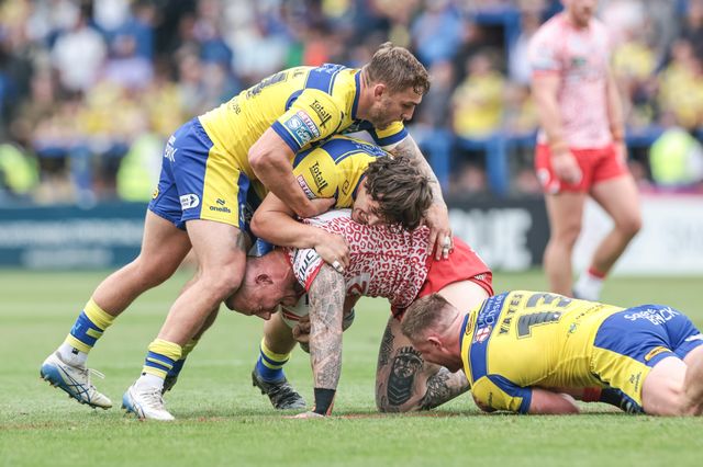 Josh Charley of Leigh Leopards is tackled by Max Wood of Warrington Wolves Luke Yates of Warrington Wolves and Sam Powell of Warrington Wolves during the Betfred Super League Round 25 match Warrington Wolves vs Leigh Leopards at Halliwell Jones Stadium, Warrington, United Kingdom, 6th September 2025

(Photo by Mark Cosgrove/News Images)