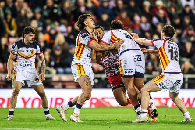 Isaac Liu of Leigh Leopards is tackled by Chris Satae of Catalans Dragons during the Betfred Super League match Leigh Leopards vs Catalans Dragons at Leigh Sports Village, Leigh, United Kingdom on 06 March 2026

(Photo by Alfie Cosgrove/News Images)