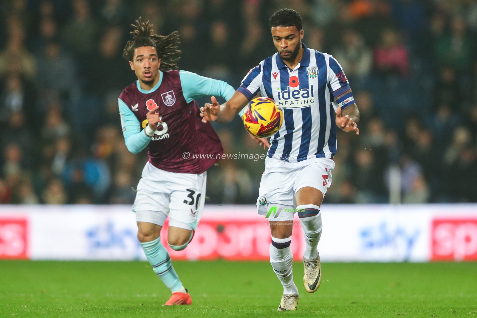 Darnell Furlong of West Bromwich Albion in action whilst getting pressured by Luca Koleosho of Burnley during the Sky Bet Championship match West Bromwich Albion vs Burnley at The Hawthorns, West Bromwich, United Kingdom, 7th November 2024

(Photo by Gareth Evans/News Images)