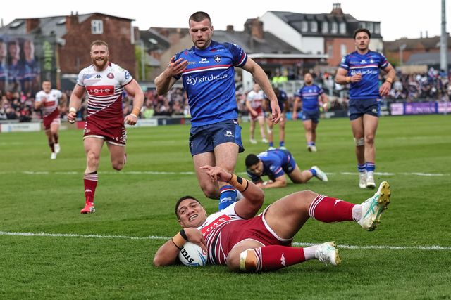 Patrick Mago of Wigan Warriors goes over for a try during the Betfred Challenge Cup Quarter Final match Wakefield Trinity vs Wigan Warriors at DIY Kitchens Stadium, Wakefield, United Kingdom on 12 April 2026

(Photo by Mark Cosgrove/News Images)