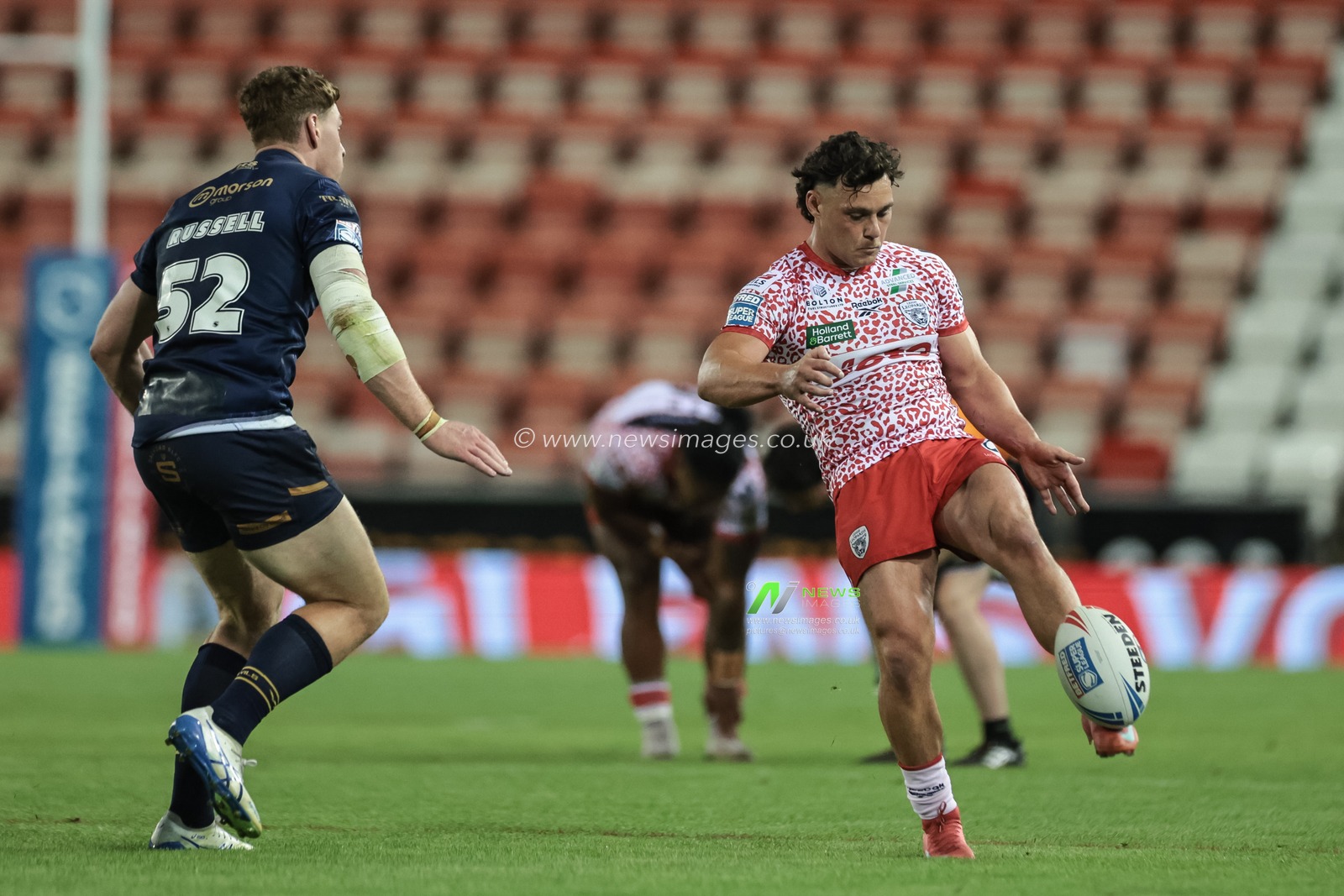 Lachlan Lam of Leigh Leopards kicks up field during the Betfred Super League Round 23 match Leigh Leopards vs Salford Red Devils at Leigh Sports Village, Leigh, United Kingdom, 22nd August 2025

(Photo by Mark Cosgrove/News Images)