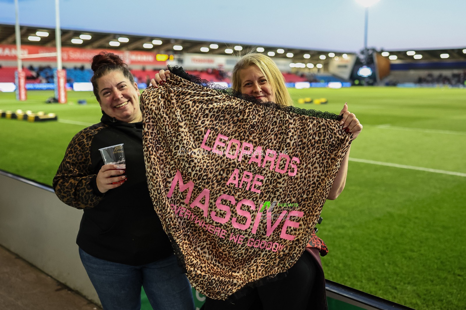 Two Leigh Leopardâ€™s fans with some huge leopard print pants with â€œLeopards are massive everywhere we goâ€ on them during the Betfred Super League play-off Eliminator 1 Salford Red Devils v Leigh Leopards at Salford Community Stadium, Eccles, United Kingdom, 27th September 2024

(Photo by Mark Cosgrove/News Images)