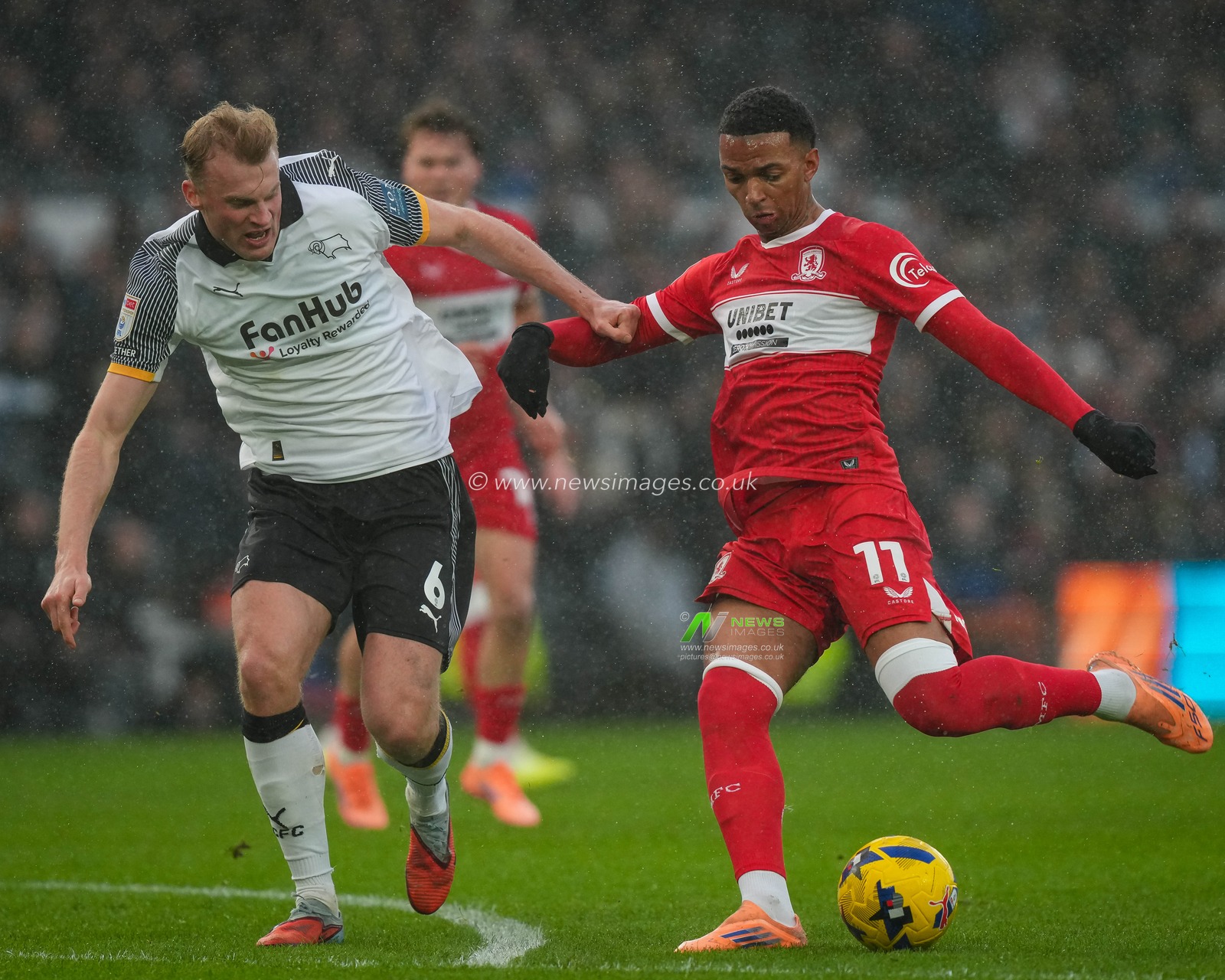 Morgan Whittaker of Middlesbrough shoots on goal while challenged by Sondre Langas of Derby County during the Sky Bet Championship match Derby County vs Middlesbrough at Pride Park Stadium, Derby, United Kingdom, 1st January 2026

(Photo by Maynard Manyowa/News Images)

*** GER AUT SUI OUT ***